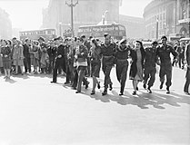 Civilians and service personnel in London celebrating V-J Day on August 15, 1945