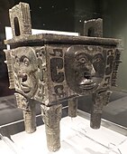 Da He ding (大禾方鼎; Dà Hé fāngdǐng); Shang dynasty; Hunan Museum. This ritual bronze is one of the very rare vessels that is decorated with human faces