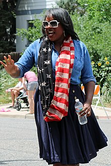 Leslie Herod greeting voters watching the 2017 Park Hill Fourth of July parade.