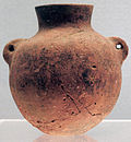 A red pot with two "ears"; by Peiligang culture; 6000–5200 BC; ceramic; Shanghai Museum