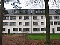 Hanau, Konversion Argonner-Kaserne, ehemaliges Kompaniegebäude 407, Rückseite zum Park (Januar 2020)