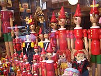Pinocchio puppets in a shop window in Florence