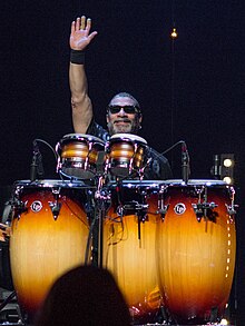 Lenny Castro performing with Joe Bonamassa in 2015