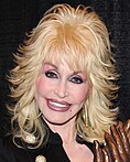 A head shot of singer Dolly Parton.