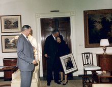 President Johnson and Lady Bird Johnson entering the White House