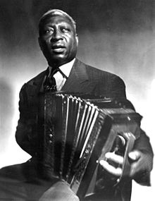 Lead Belly with a melodeon c. 1942