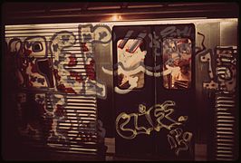 Rampant graffiti hampers visibility into and out of New York City Subway cars (1973).