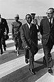 Arrival of Vice President of Cameroon J. Foncha at Schiphol, left behind his wife Mr. Ngu on the right