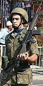 Cyprus National Guard soldier, wearing a blue ascot