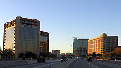 Buildings in north Dallas (left, east) and Addison (right, west) at the Dallas North Tollway and Arapaho Road