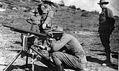 Colorado National Guard using a tripod-mounted M1895 Colt-Browning machine gun