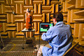 Product testing headphones in an anechoic chamber