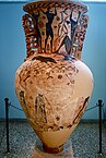 Fig. 2. Two wingless cauldron-headed Gorgons with wasp-shaped bodies chase Perseus (on the body of the vase below the neck); Eleusis Amphora, Eleusis, Archaeological Museum 2630 (mid seventh century BC)[68]