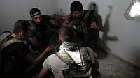 Free Syrian Army rebels hold a planning session