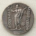 Poseidon holding a palm branch on the reverse of a tetradrachm of Antimachus I Theos, king of Bactria (2nd century BC)