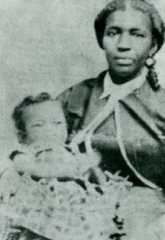 A photograph of Du Bois as an infant being held by his mother