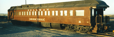 A Pullman rail car, in traditional brown