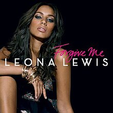 The image features a black-haired woman sitting in front of a black background. She is wearing a short dress and bracelets on her right wrist. In front of her, the words "Forgive Me" in cursive letters appear while below those words, "Leona Lewis" is written in capital letters.