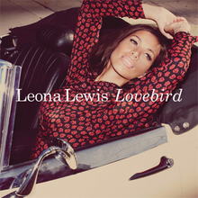 A brunette woman sits in an open convertible looking into the distance, wearing a polka dot red top. It says the name of the artist "Leona Lewis" in the Century Schoolbook type-face followed by the title of the song, "Lovebird".