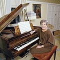 Hazel Hawke at the original Australian-made Beale piano, which she found and restored during her time in The Lodge, c. 1980s