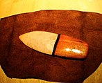A Northern Ute ceremonial knife made from white quartz and Western cedar wood. These knives were used to cut the umbilical cord of a newborn infant or to harvest sweetgrass and other sacred herbs for ceremonies.