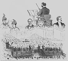 Drawing of scenes from the festival premiere of The Golden Legend showing the chorus, the faces of the principal singers and Sullivan's back, as he stands conducting. Black and white.