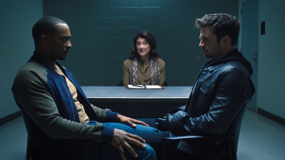 (L-R): Falcon/Sam Wilson (Anthony Mackie), therapist (Amy Aquino) and Winter Soldier/Bucky Barnes (Sebastian Stan) in Marvel Studios' THE FALCON AND THE WINTER SOLDIER exclusively on Disney+. Photo courtesy of Marvel Studios. ©Marvel Studios 2021. All Rights Reserved.