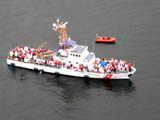 Passengers are evacuated from the Empress of the North as seen in this image made available by the United States Coast Guard.