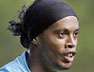Ronaldinho keen to overcome problems and stay with Barcelona