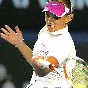 Australian tennis player Casey Dellacqua plays a forehand return during her womens singles match against Serbian opponent Jelena Jankovic at the Australian Open tennis tournament in Melbourne, 20 January 2008.  The first set is in a tie break as play continues.