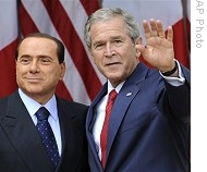 President Bush waves as he and Italian Prime Minister Silvio Berlusconi conclude their joint statement in Rose Garden of White House, 13 Oct 2008
