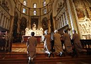 Grey Nuns sisters pray recently at the altar containing remains of Ste. Marguerite dYouville in their Montreal chapel. Christinne Muschi for The Globe and Mail
