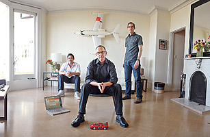 Founder John Tayman, second from left, with designer David Albertson, left, and Nick Hodulik, developer.