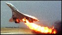 Air France Concorde flight 4590 takes off with fire trailing from its engine on the left wing from Charles de Gaulle airport in Paris, 2000