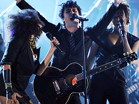 Green Day's Billie Joe Armstrong performs with the cast of "American Idiot" at the 2010 Grammy Awards