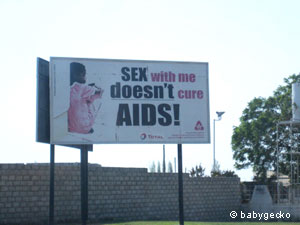 A road sign in Zambia confronting the virgin AIDS cure myth