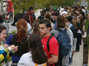 Students wait in a long line to vote Tuesday on the campus of the University of Central Florida.