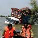 Pakistani army rescuers pass a stranded truck as they search for flood survivors to evacuate from Khairpur Nathan Shah, 4 Sep 2010