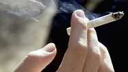 For condo associations, smoking ban hits home