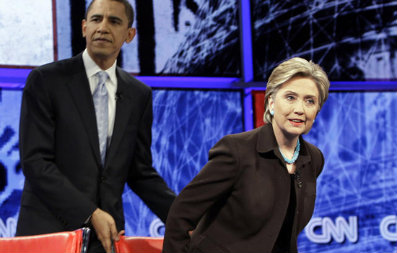 FILE: Sen. Barack Obama first pledged opening up legislative negotiations to C-SPAN cameras during a Democratic presidential primary debate with Sen. Hillary Clinton in Los Angeles on Jan. 31, 2008. In this photo, Obama helps Clinton to her seat before the start of that debate. (AP Photo)