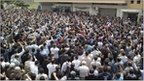 Protesters shout slogans during a demonstration after Friday prayers in the Syrian port city of Baniyas on 29 April 2011