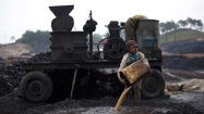 In northeast India coal towns, many miners are children