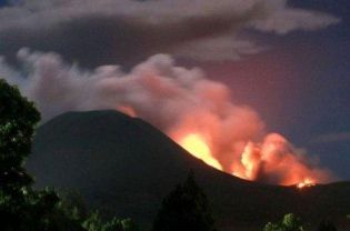 The Lokon volcano erupts near Tomohon