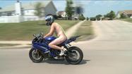 Man Rides Motorcycle "Nearly Naked" To Beat The Heat