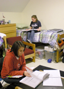 Stefanie Gregorini and Pamela Smith study in their West Halls suite before midterms.
