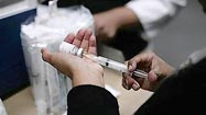 Vaccines largely safe, U.S. expert panel finds