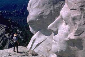 close up photo of the faces on Mount Rushmore