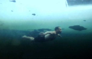 Watch Madman Plunge Into Arctic Water Like Whoa