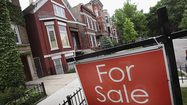 Existing home and condo sales up, prices down in Chicago area