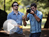 Photo: Photographer filming a juggler